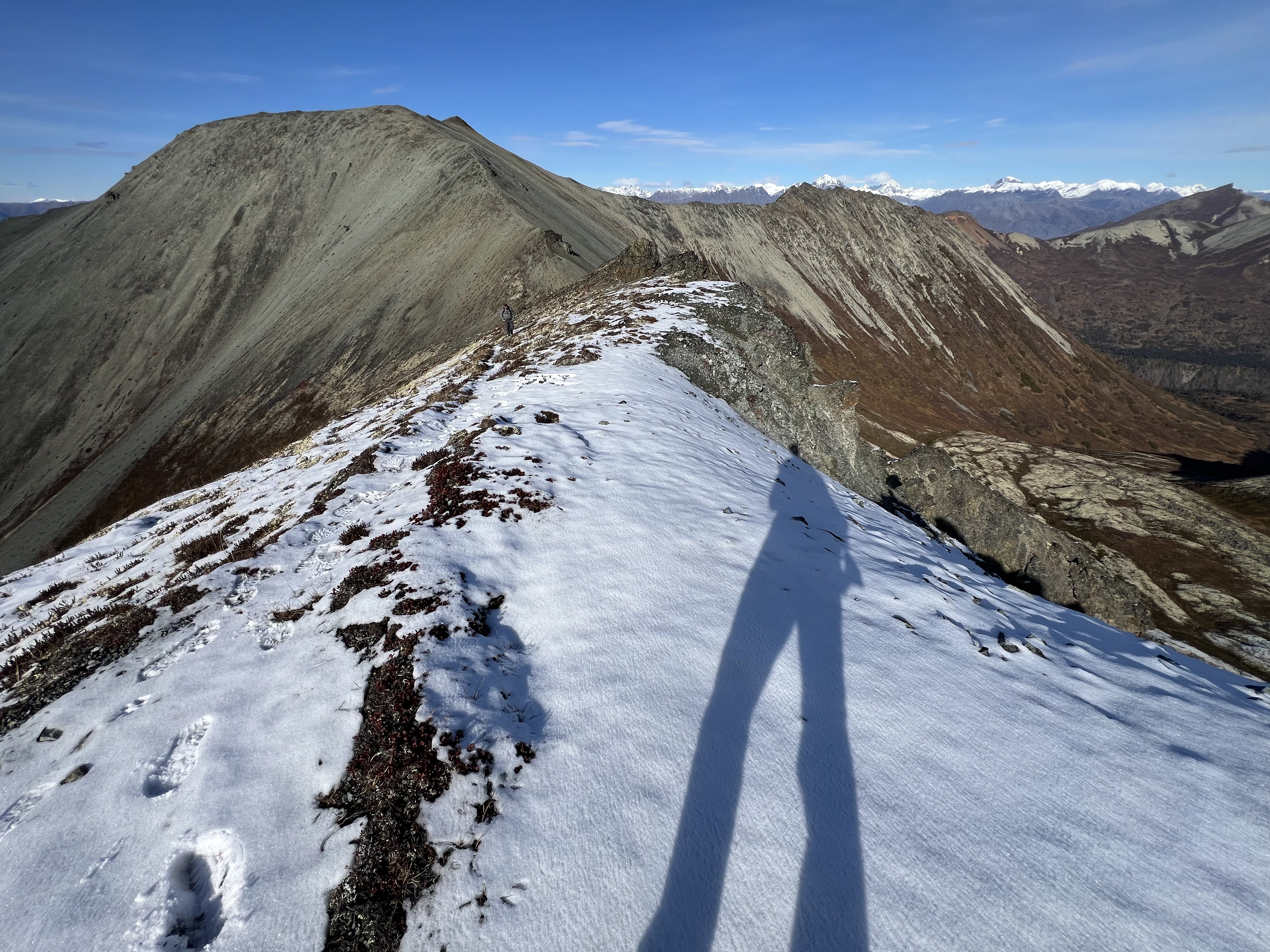 Standing in the snow looking back at Peak 4199