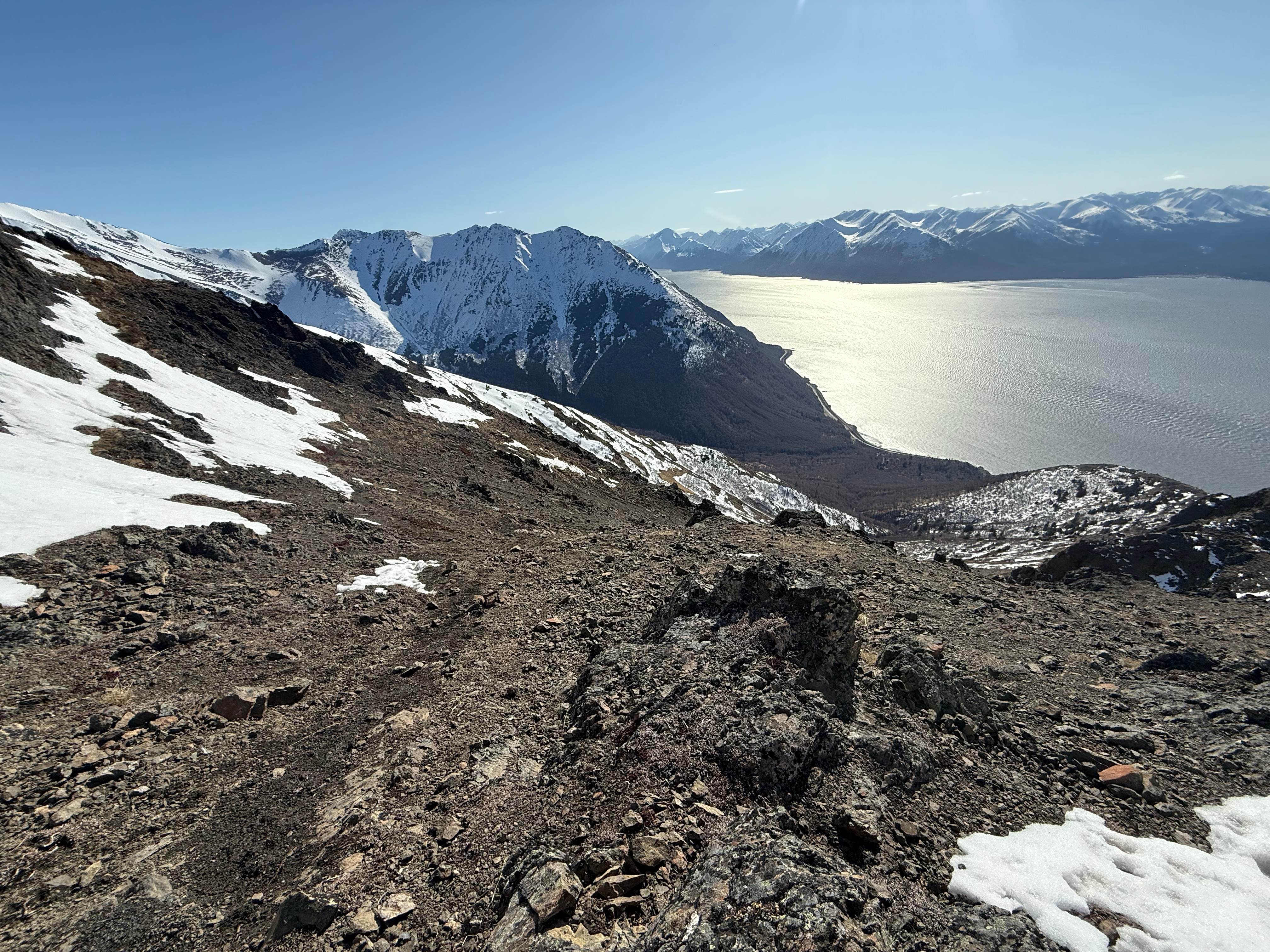 Facing down the steep scree field towards the ocean.